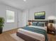 Comfortable bedroom with ample natural light, modern furnishings, and a peaceful ambiance at 8018 Colby Cir, Orlando, FL 32817
