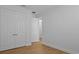 Bedroom featuring wood-look flooring and double closets, perfect for storage at 8018 Colby Cir, Orlando, FL 32817