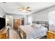 Spacious bedroom with natural light, hardwood floors, and modern decor at 803 Arlington Blvd, Altamonte Springs, FL 32701