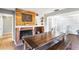 Spacious dining room featuring large table, fireplace, and modern decor at 803 Arlington Blvd, Altamonte Springs, FL 32701