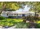 Charming single-story home with a well-manicured lawn and inviting landscaping at 803 Arlington Blvd, Altamonte Springs, FL 32701