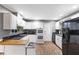 Clean kitchen design featuring white cabinets and modern appliances at 803 Arlington Blvd, Altamonte Springs, FL 32701