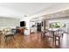 Spacious living room with hardwood floors, with view to dining area and kitchen at 803 Arlington Blvd, Altamonte Springs, FL 32701