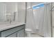 A modern bathroom with a shower/tub combo, sleek vanity, and modern fixtures at 891 Megano Blvd, Deland, FL 32724
