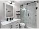 Modern bathroom with glass shower door, sleek vanity, and stylish fixtures at 9104 Stromboli Ct, Kissimmee, FL 34747