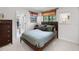 Cozy bedroom featuring a comfortable bed with decorative pillows and ample natural light at 9104 Stromboli Ct, Kissimmee, FL 34747