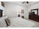 Bright main bedroom with a television and connecting bathroom at 9104 Stromboli Ct, Kissimmee, FL 34747