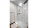 Modern shower featuring a large glass enclosure, white subway tiling and a shower caddy at 9104 Stromboli Ct, Kissimmee, FL 34747
