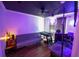 Fun bonus room featuring foosball table, futon, and gaming setup at 10255 Cody Ln, Orlando, FL 32825
