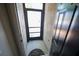 View of the front door showing a black screen door and decorative welcome mat at 10255 Cody Ln, Orlando, FL 32825