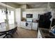 Open kitchen with modern appliances, granite countertops, and a cozy dining area at 10255 Cody Ln, Orlando, FL 32825