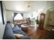 Inviting living room with wood floors, open floor plan, and neutral tones at 10255 Cody Ln, Orlando, FL 32825