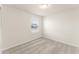 Bedroom featuring neutral walls and carpet with a window allowing natural light at 10959 Vesper Aly, Orlando, FL 32829