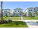 Charming two-story home with a well-manicured lawn and inviting curb appeal at 10959 Vesper Aly, Orlando, FL 32829