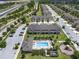 Aerial view features community pool and playground, with convenient highway access nearby at 1109 Pavia Dr, Apopka, FL 32703