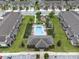 Aerial photo displays the community pool, clubhouse, and playground amenities at 1109 Pavia Dr, Apopka, FL 32703