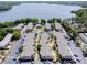 Community aerial view featuring lake access, pool, and well-maintained complex at 1163 Paseo Del Mar # B, Casselberry, FL 32707