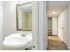 Bathroom features a vanity sink and a tiled shower at 1163 Paseo Del Mar # B, Casselberry, FL 32707