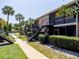 Low angle of exterior of home on a sunny day at 1163 Paseo Del Mar # B, Casselberry, FL 32707