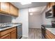 Updated kitchen features stainless steel appliances and granite countertops at 1163 Paseo Del Mar # B, Casselberry, FL 32707