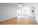 Bright living room with new floors and sliding glass door to the patio at 1163 Paseo Del Mar # B, Casselberry, FL 32707