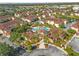 Aerial view showcasing the community pool area surrounded by lush landscaping at 12212 Wild Iris Way # 106, Orlando, FL 32837