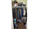 Walk-in closet with clothing rack, shelving and laminate flooring at 12212 Wild Iris Way # 106, Orlando, FL 32837