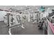 Spacious gym with modern fitness equipment and mirrored walls at 12212 Wild Iris Way # 106, Orlando, FL 32837