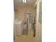 Functional laundry room equipped with a washer, dryer, storage shelves, and cleaning supplies at 12212 Wild Iris Way # 106, Orlando, FL 32837