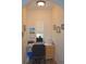 Compact office nook featuring a built-in desk, natural light from a window, and neutral decor at 12212 Wild Iris Way # 106, Orlando, FL 32837