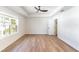 Spacious bedroom with tray ceiling and hardwood floors at 1321 Weber St, Orlando, FL 32803