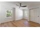 Bedroom featuring two windows and closet at 1321 Weber St, Orlando, FL 32803
