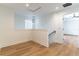 Bright hallway with hardwood floors and modern lighting at 1321 Weber St, Orlando, FL 32803