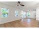 Bright living room with hardwood floors and large windows providing ample natural light at 1321 Weber St, Orlando, FL 32803