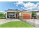 Charming home with a well-manicured lawn and fenced yard at 13347 Gabor Ave, Orlando, FL 32827