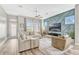 Spacious living room features a large sectional sofa, accent wall, and natural light at 13347 Gabor Ave, Orlando, FL 32827