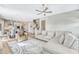 Open-concept living space showcasing the living room, dining area, and kitchen, ideal for entertaining at 13347 Gabor Ave, Orlando, FL 32827