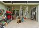 Overcrowded back porch and patio area with wind chimes at 13609 Sky Blue Ct, Orlando, FL 32828