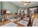 Dining room with long, ornate wood table, carved chairs, and decorative centerpieces at 13609 Sky Blue Ct, Orlando, FL 32828