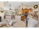 Open floorplan seamlessly integrates the kitchen and living room, creating an inviting atmosphere for gatherings at 13609 Sky Blue Ct, Orlando, FL 32828