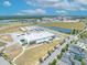 An aerial view of the building including a lake nearby at 13913 Hahn Ln, Orlando, FL 32827