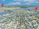 Expansive aerial view showcasing the community's proximity to lakes, hospitals, and amenity centers at 13913 Hahn Ln, Orlando, FL 32827