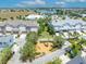 Aerial view showcases lush green spaces and playground in the community at 13913 Hahn Ln, Orlando, FL 32827