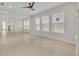 Spacious living area with ample natural light showcases new hardwood flooring at 13913 Hahn Ln, Orlando, FL 32827
