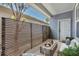 Outdoor patio area showcasing modern privacy screen and comfortable seating at 13913 Hahn Ln, Orlando, FL 32827