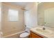 Bathroom featuring shower-tub combo, vanity, and tile flooring at 14155 Portrush Dr, Orlando, FL 32828