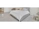 Spacious bedroom showcasing tile floors and a large, comfortable bed at 1541 Tali Ln, Mount Dora, FL 32757