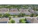 A charming residential neighborhood with townhomes and mature trees at 15651 Kinnow Mandarin Ln, Winter Garden, FL 34787