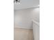 Neutral colored hallway with carpet and an overhead light fixture at 15651 Kinnow Mandarin Ln, Winter Garden, FL 34787
