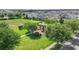 A playground in a well-maintained community with green spaces and manicured lawns at 15651 Kinnow Mandarin Ln, Winter Garden, FL 34787